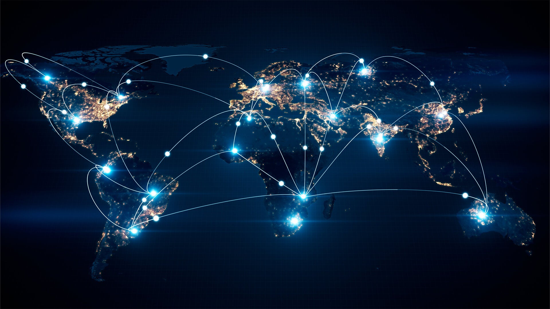 digital world map at night showing global connectivity with glowing network lines and bright connection points across continents