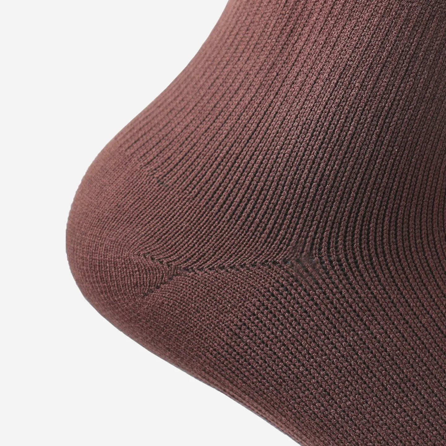 a close up view of classic brown wudhu socks wore on heel