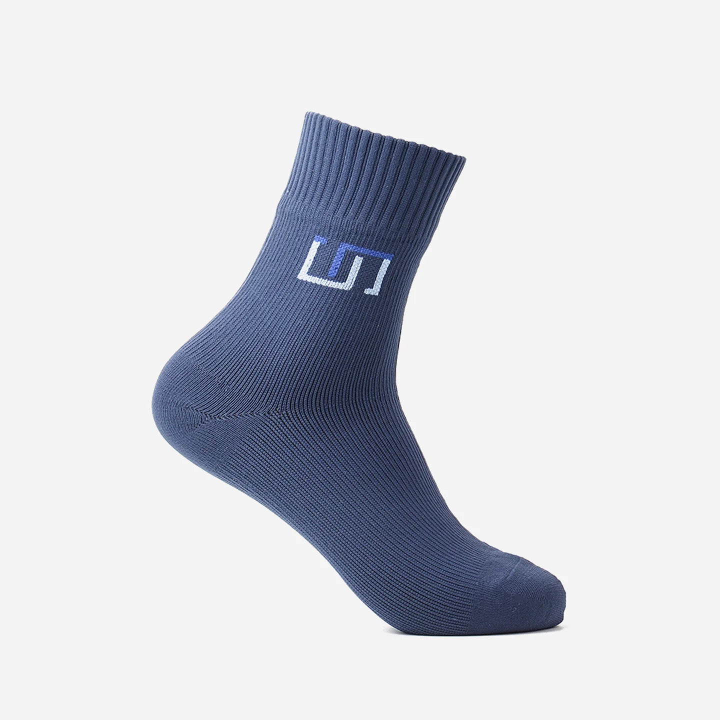 a navy blue wudhu sock with The Wudhu Socks logo in blue and light blue color on the upper part