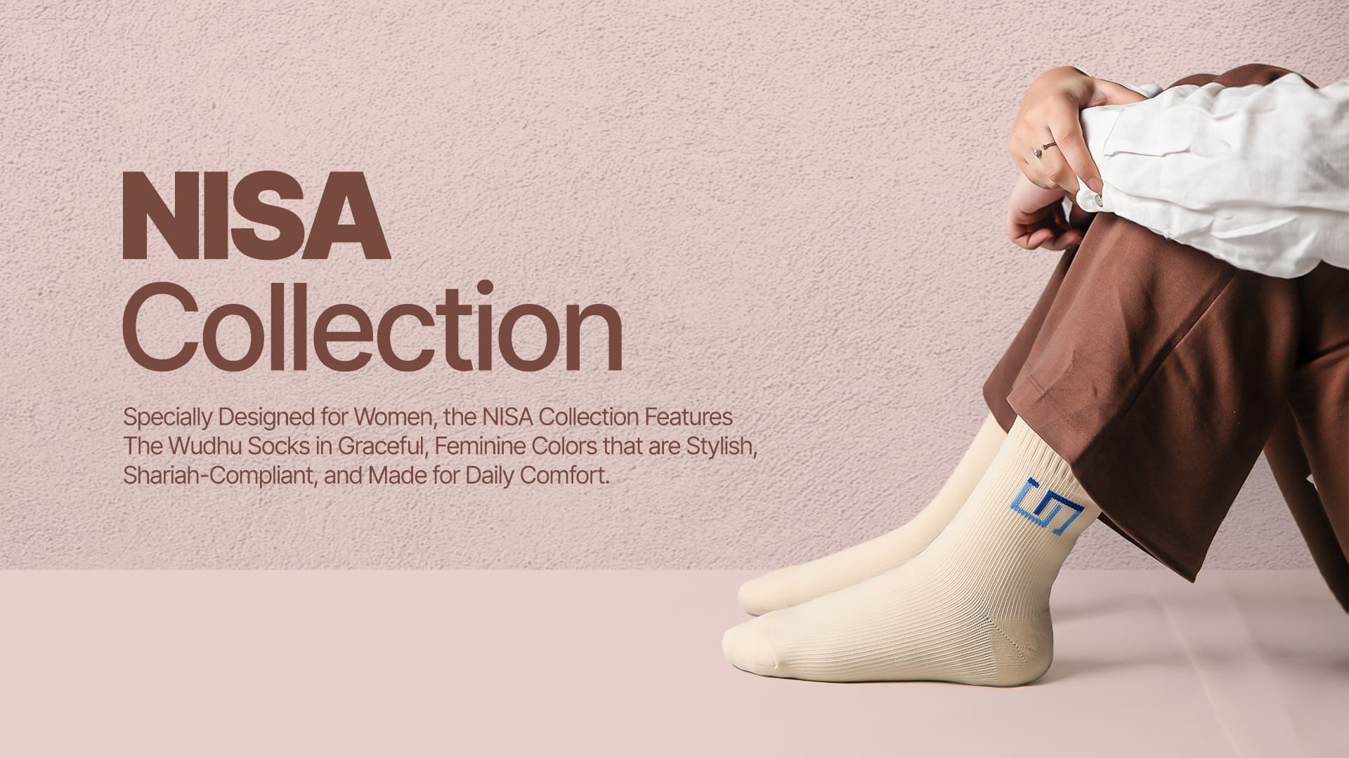 NISA Collection advertisement image with a woman wearing soft ivory colored socks on a light pink background