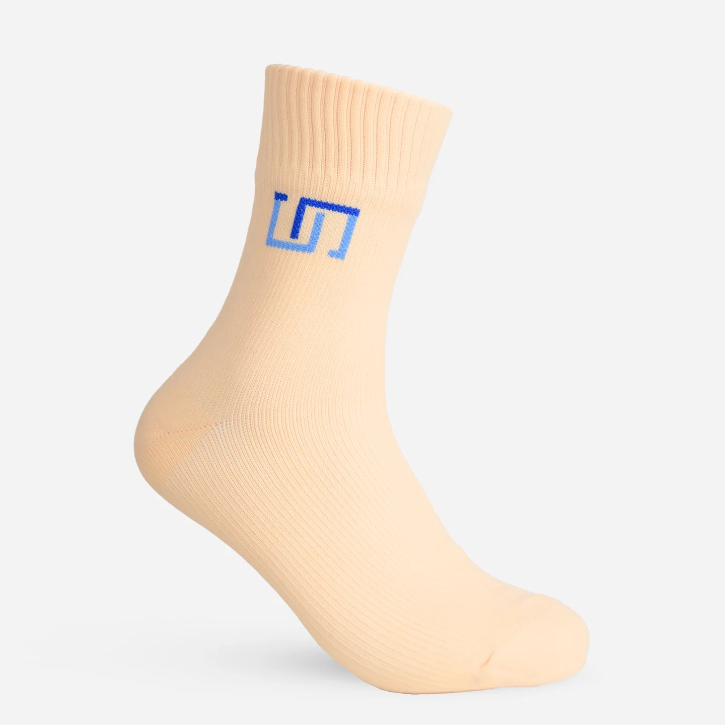 a soft ivory wudhu sock with The Wudhu Socks logo in blue on the upper part