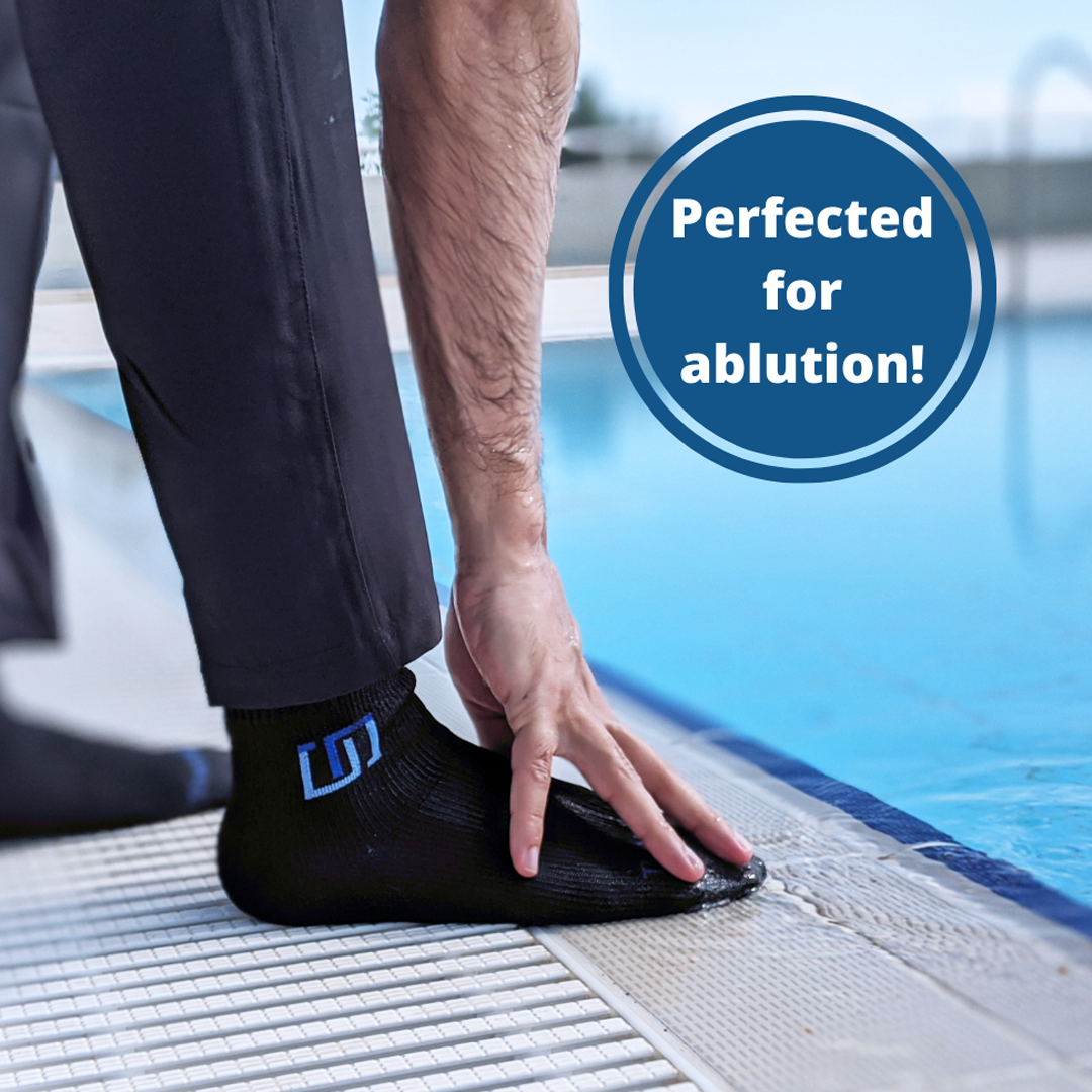 Doing masah over khuff - wiping over socks for wudu